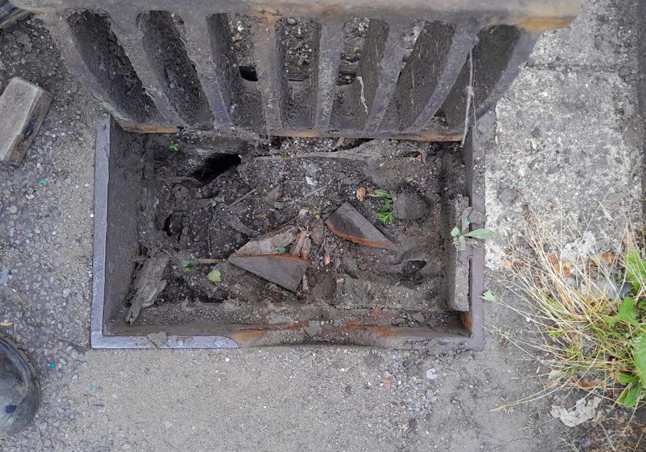 Blocked and damaged manhole